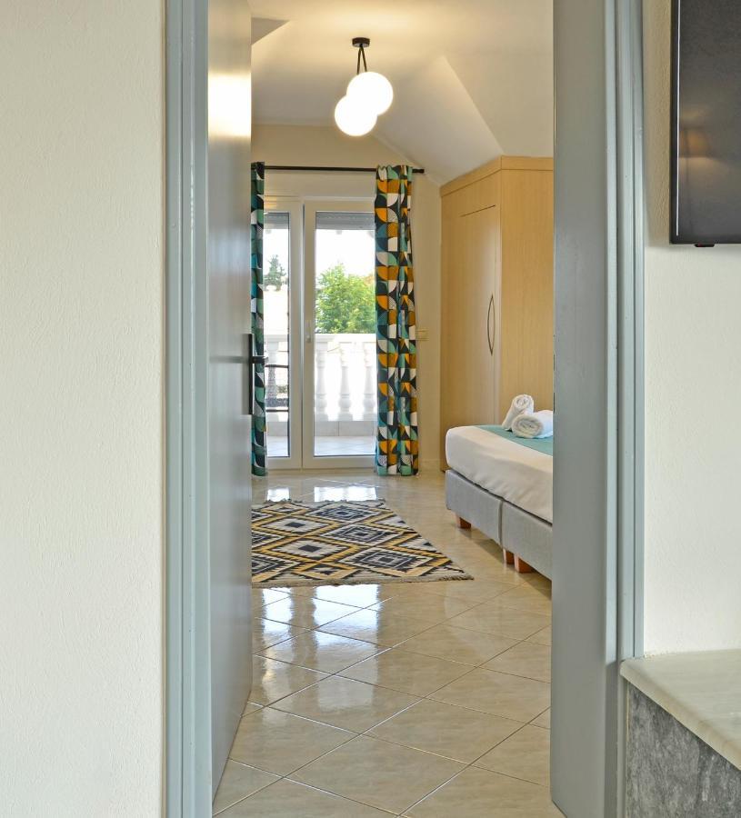 Joya Ofrynio Stylish Suites Ofrínion Rom bilde
